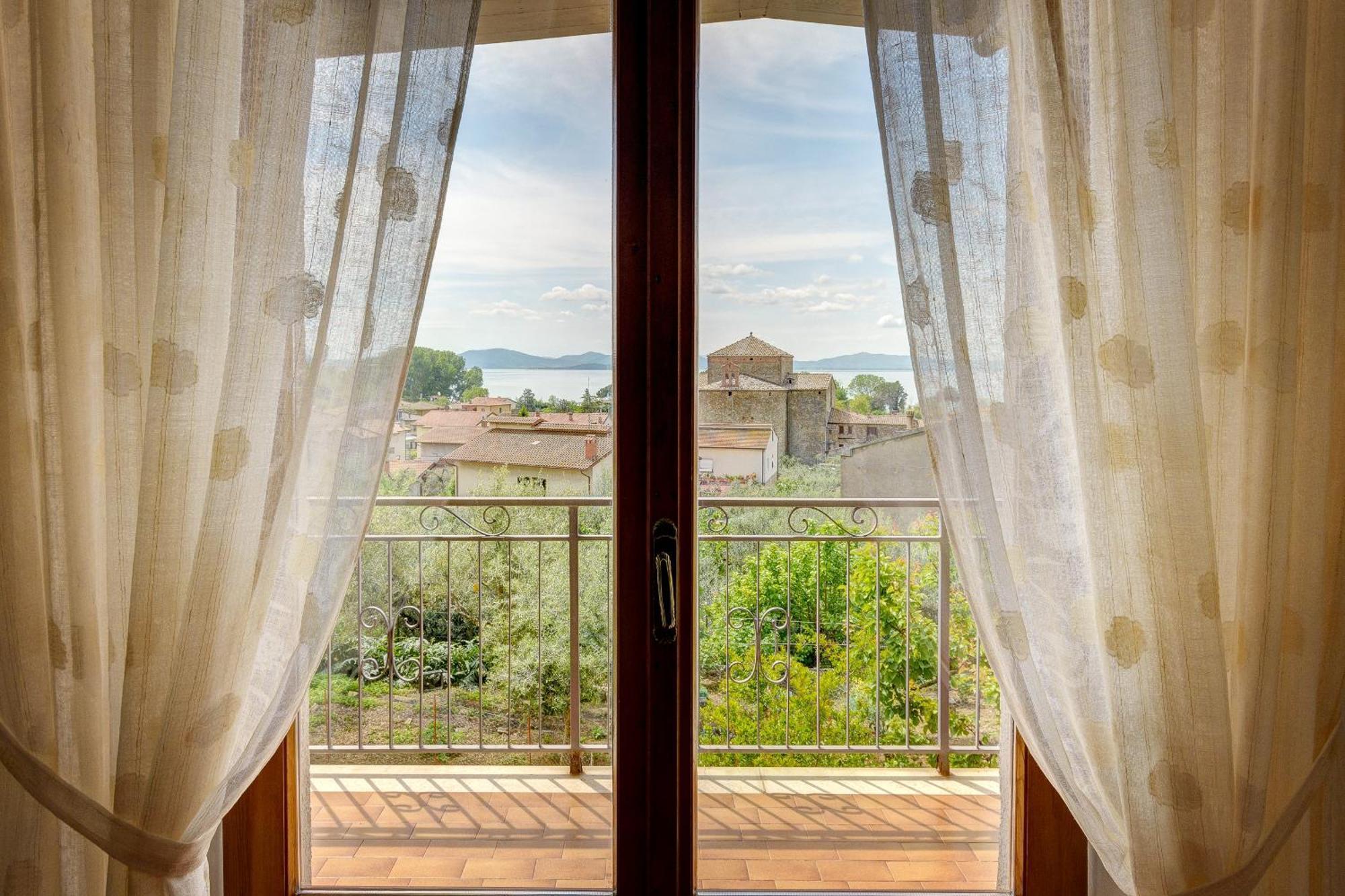Appartamento Luisa - Vista Lago Пассиньяно-суль-Тразимено Экстерьер фото